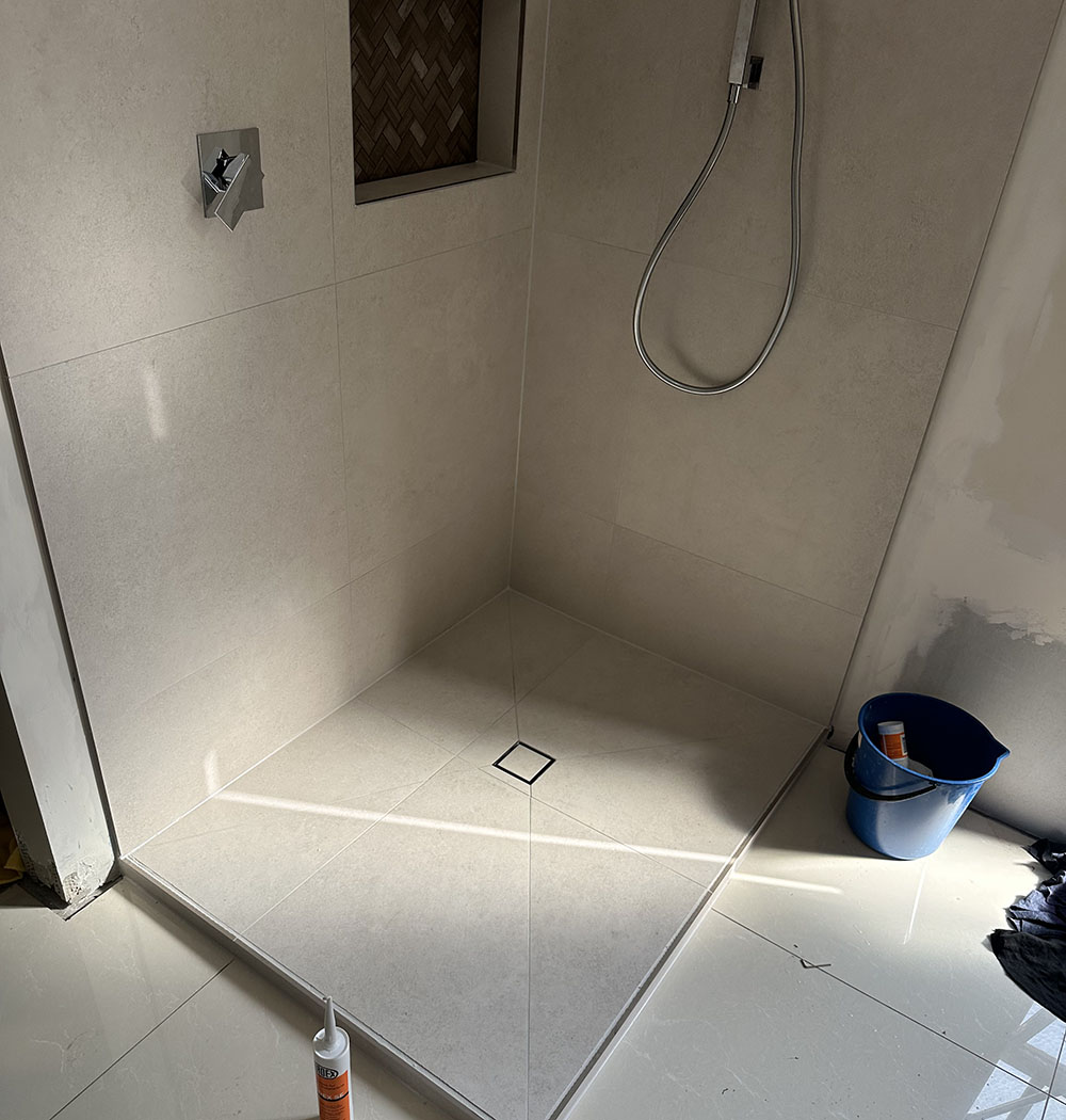 New shower just been grouted and caulked